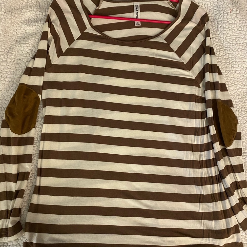 Long sleeve shirt with elbow pads.